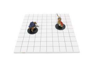 Two miniatures on a white board with a square grid.
