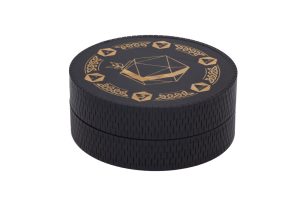 A black box with a gold design on it.