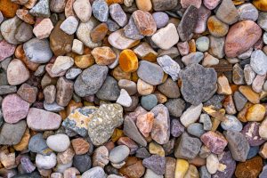 A close up of a pile of rocks and pebbles.